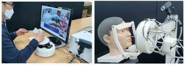 한국기계연구원 서준호 박사 연구팀이 비대면 원격 검체 채취 로봇을 시연하고 있다. (한국기계연구원 제공)