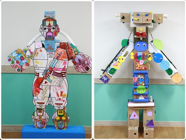 사진 왼쪽부터 인공지능 AI 놀이반 1기에서 합동 제작한 로봇 ‘아이언맨’과 2기에서 합동 제작한 창작 로봇 ‘리사이클AI’. / 경성유치원 제공
